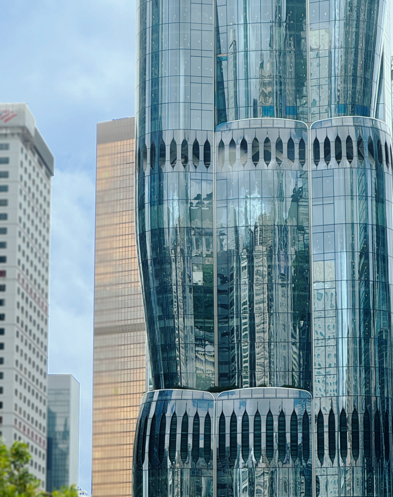 The Henderson is a 190-meter-tall building which takes the unique shape of a bauhinia bud with a 3D-curved glass façade.
