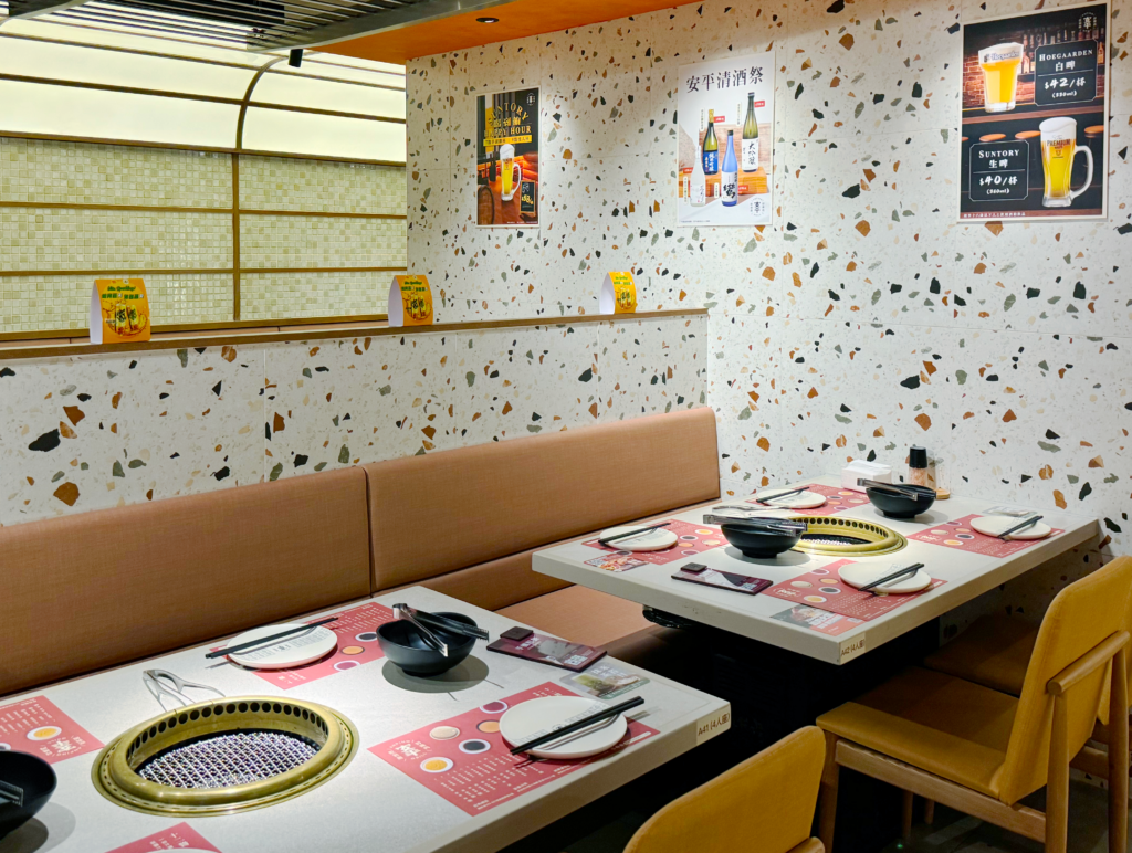 The terrazzo tiles create a focus for the restaurant interior with their fancy patterns.