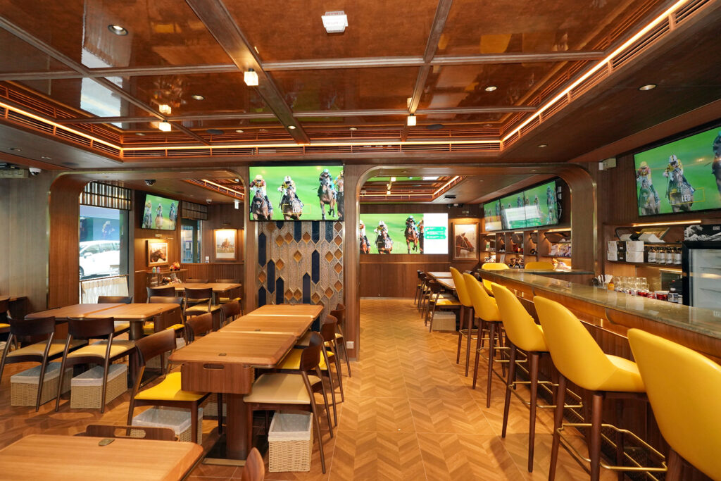 HKJC's betting branch in Wan Chai, uses ASA's timber floor tiles, fishbone patterns